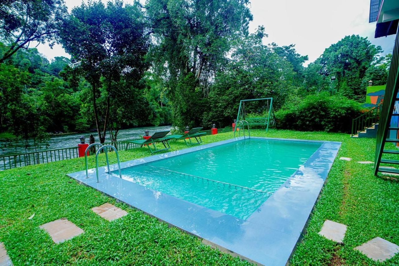 Falcon Riverview Resorts Kuttampuzha Esterno foto